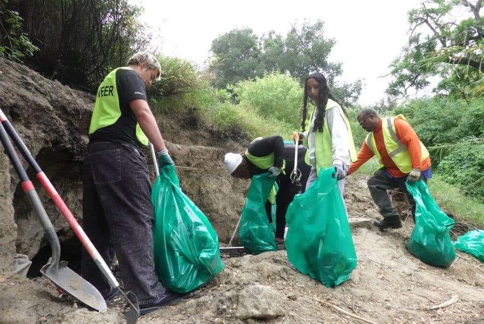 volunteers picking up trash