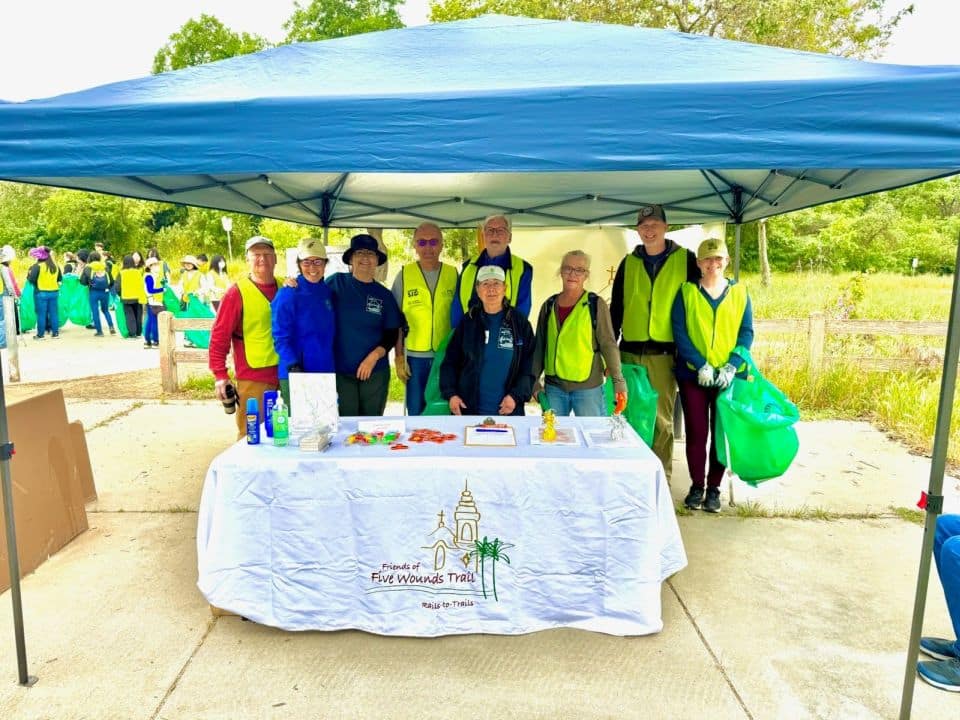 friends of five wounds trail members and friends posing at table